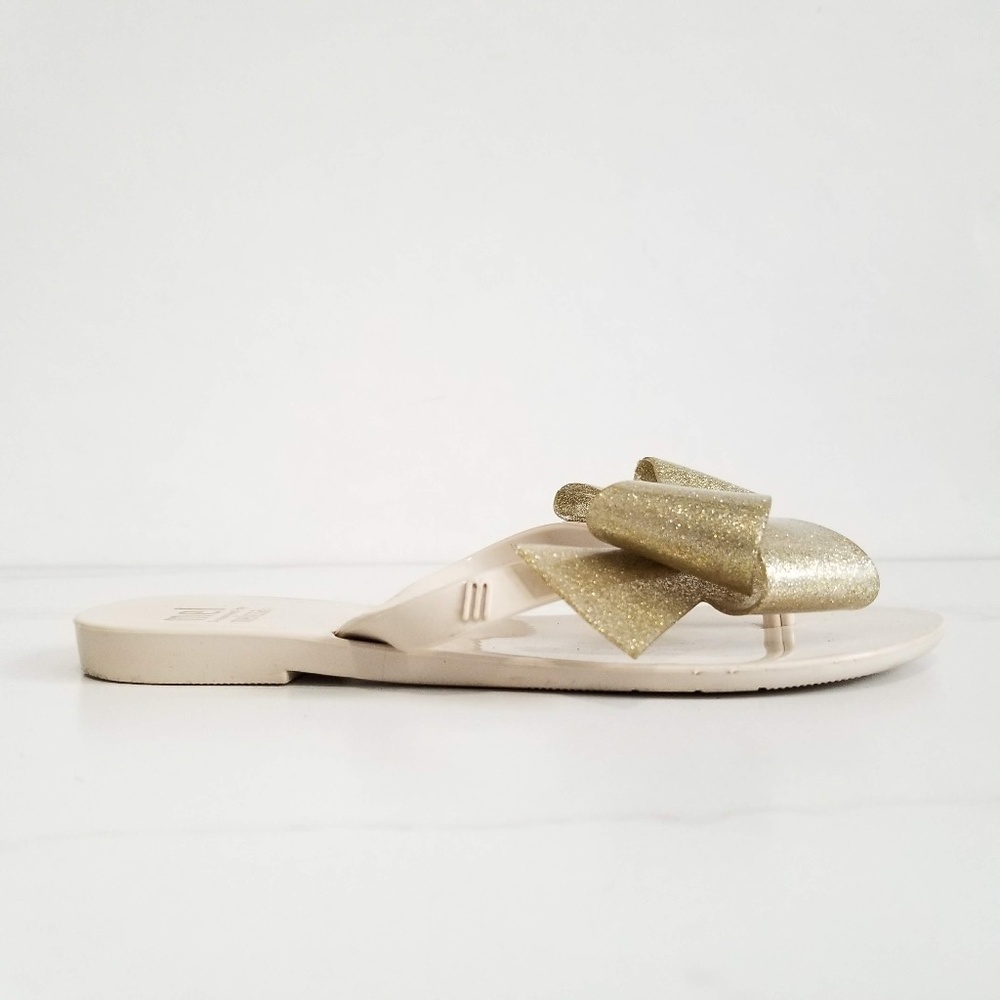 MEL by MELISSA Harmonic Gold Bow III Flip Flops - Picture 2 of 11